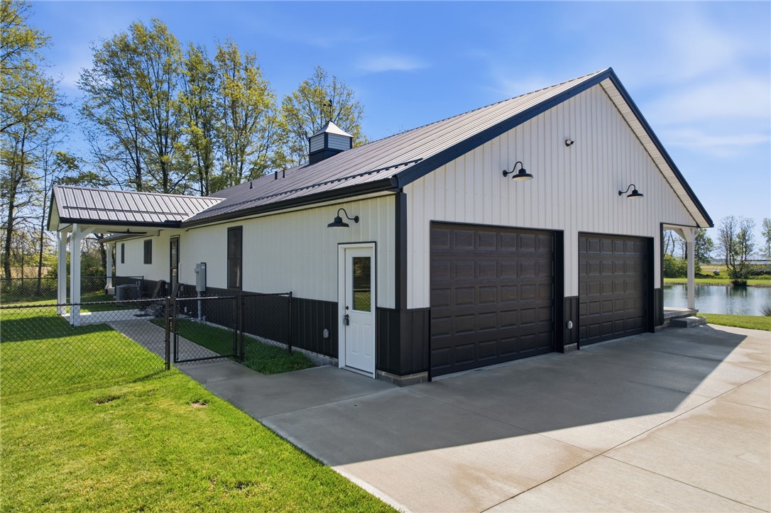 1602 Westboro Road Blanchester, OH 45107 - Photo 4 of 81 This newly constructed property offers expansive parking and scenic water views, perfect for a modern lifestyle.
