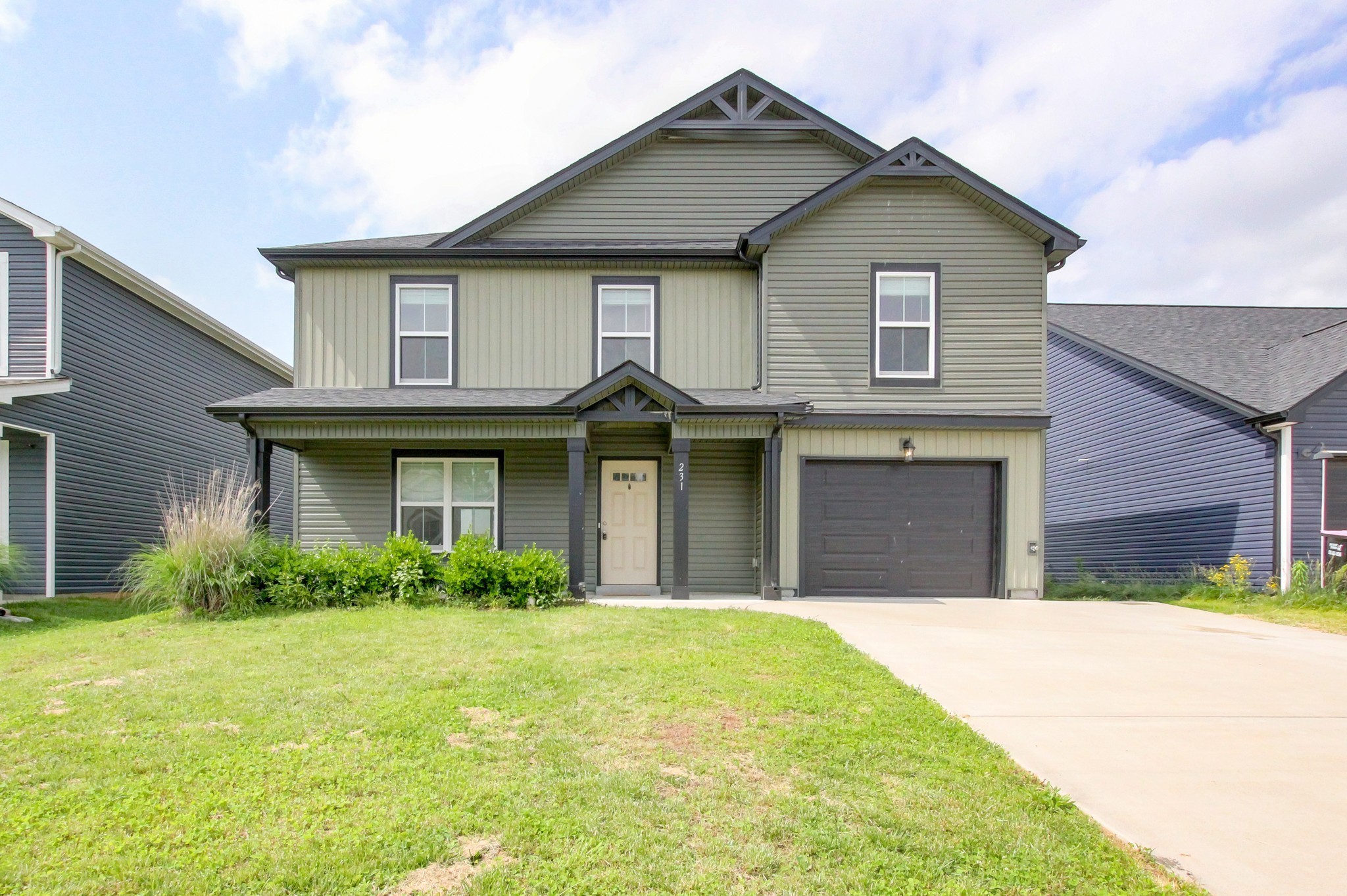 231 King Road Clarksville, TN 37042 - Photo 1 of 26 a front view of a house with a garden