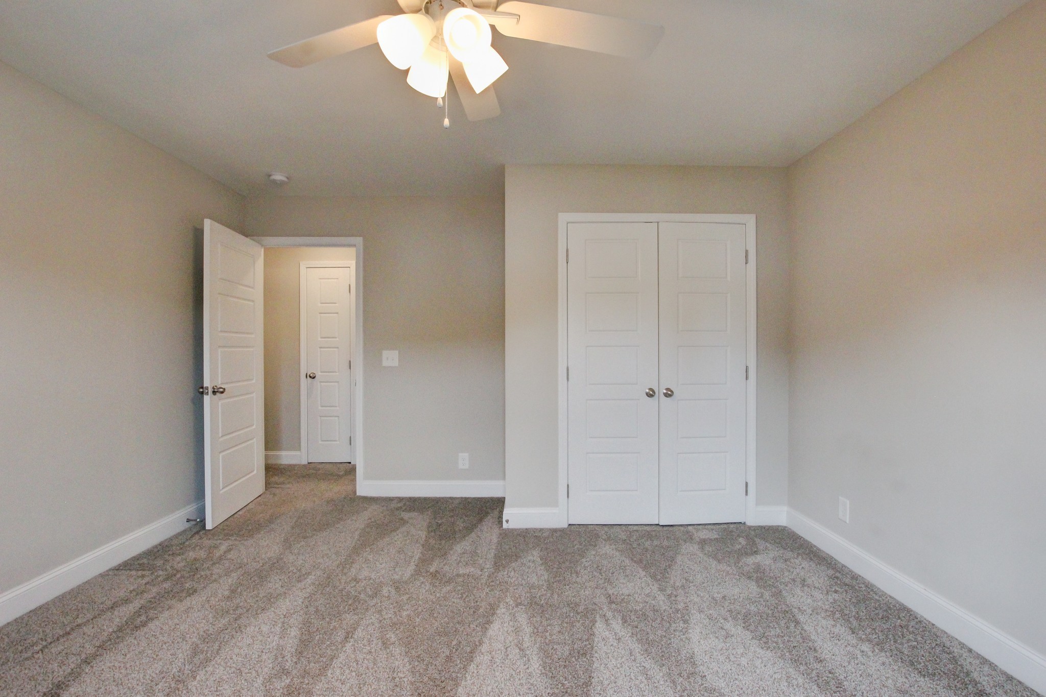 231 King Road Clarksville, TN 37042 - Photo 19 of 26 a view of an empty room with a chandelier fan