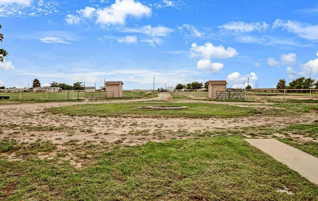1703 Owl Road Lubbock, TX 79407 - Photo 25 of 33 a view of a big room with a big yard