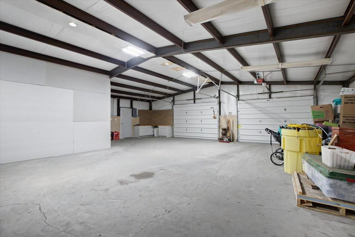 1703 Owl Road Lubbock, TX 79407 - Photo 32 of 33 a view of storage and utility room with stairs