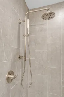 a view of patio with couple of couch and chairs