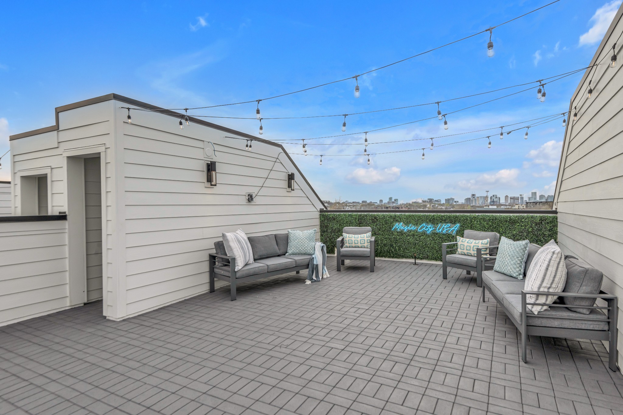 2176 Carson Street, Unit 4 Nashville, TN 37211 - Photo 40 of 45 a view of a patio with couches chairs and potted plants