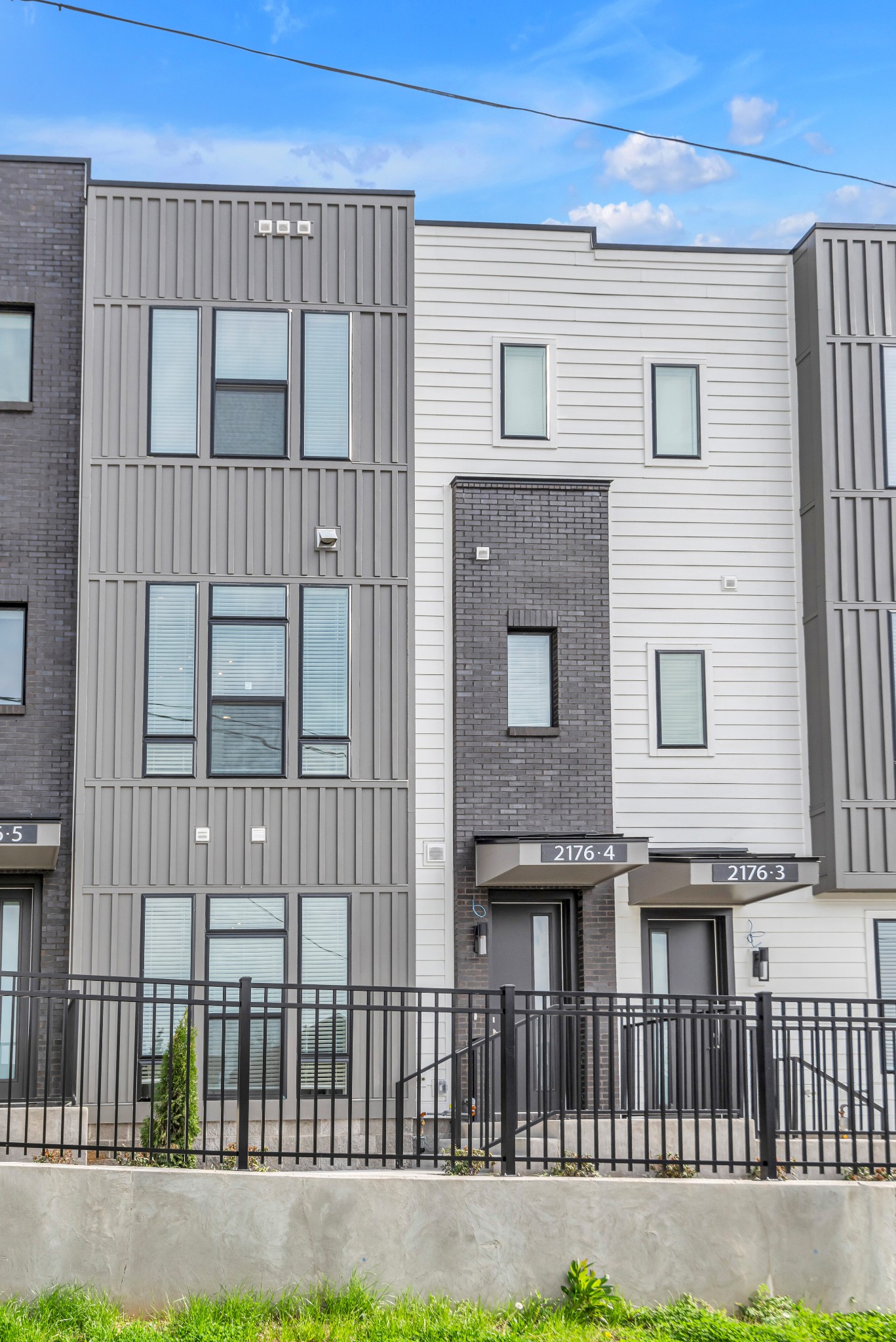 2176 Carson Street, Unit 4 Nashville, TN 37211 - Photo 45 of 45 a brick house with large windows and a yard