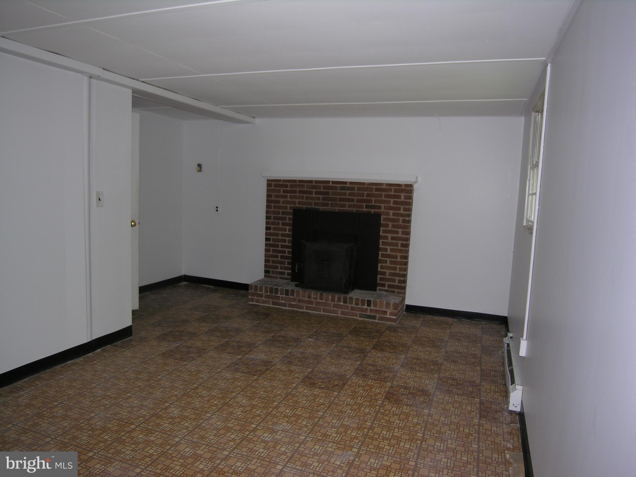 616 Embreeville Road Downingtown, PA 19335 - Photo 40 of 46 Family Rm #2 Lwr Lvl with Brick FP w/Wd Burning St