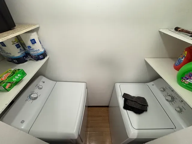 a utility room with dryer and washer