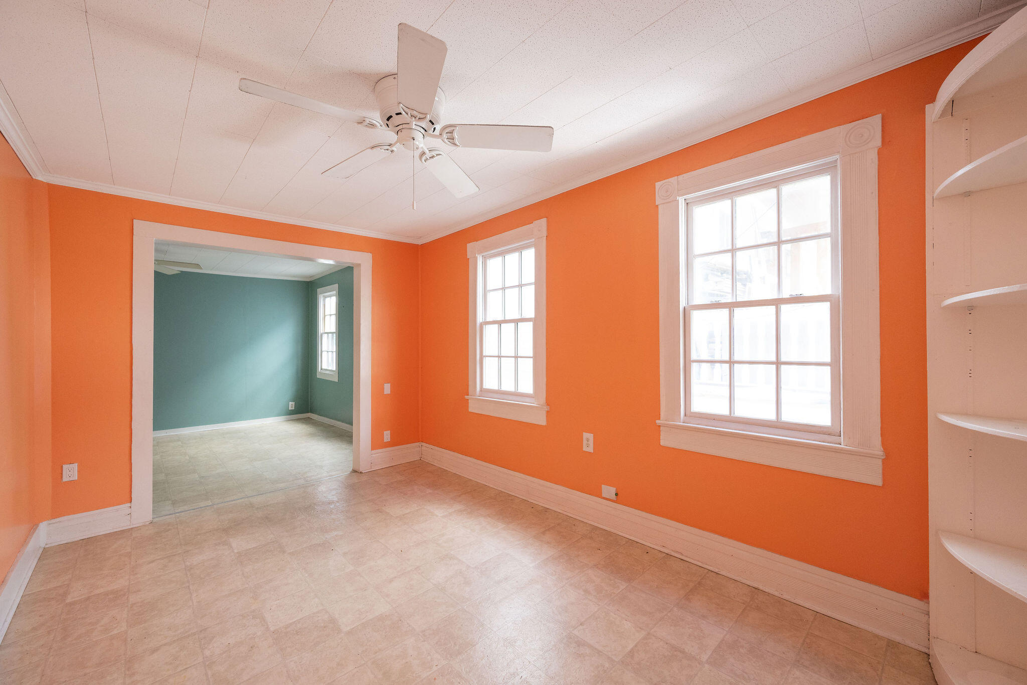1115 Fleming Street Key West, FL 33040 - Photo 23 of 31 an empty room with windows and fan