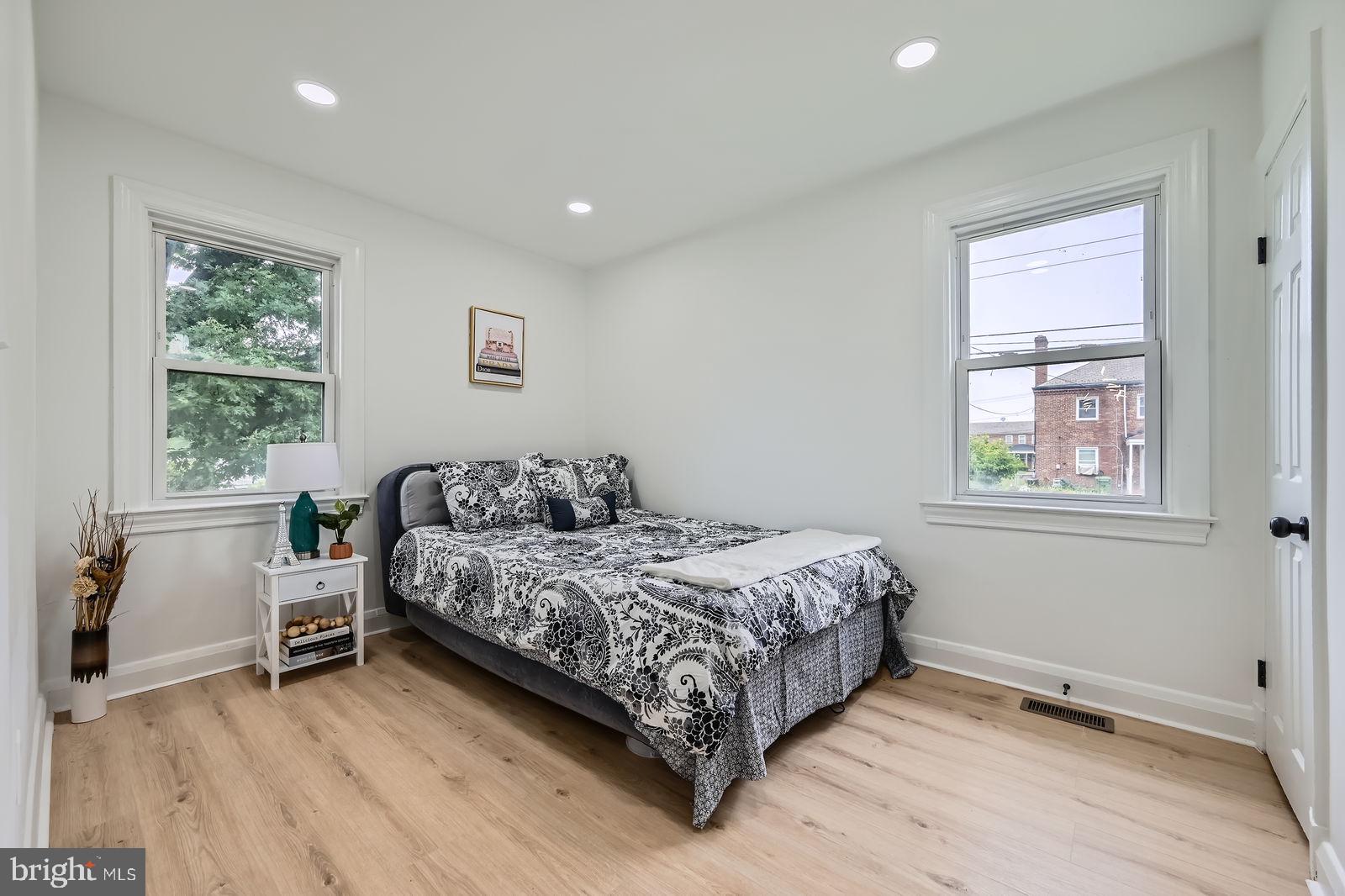 3814 Cedardale Road Baltimore, MD 21215 - Photo 13 of 28 a bedroom with a bed and a window