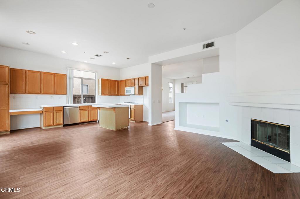 1930 Del Amo Way Oxnard, CA 93036 - Photo 11 of 31 a view of kitchen with wooden floor and electronic appliances