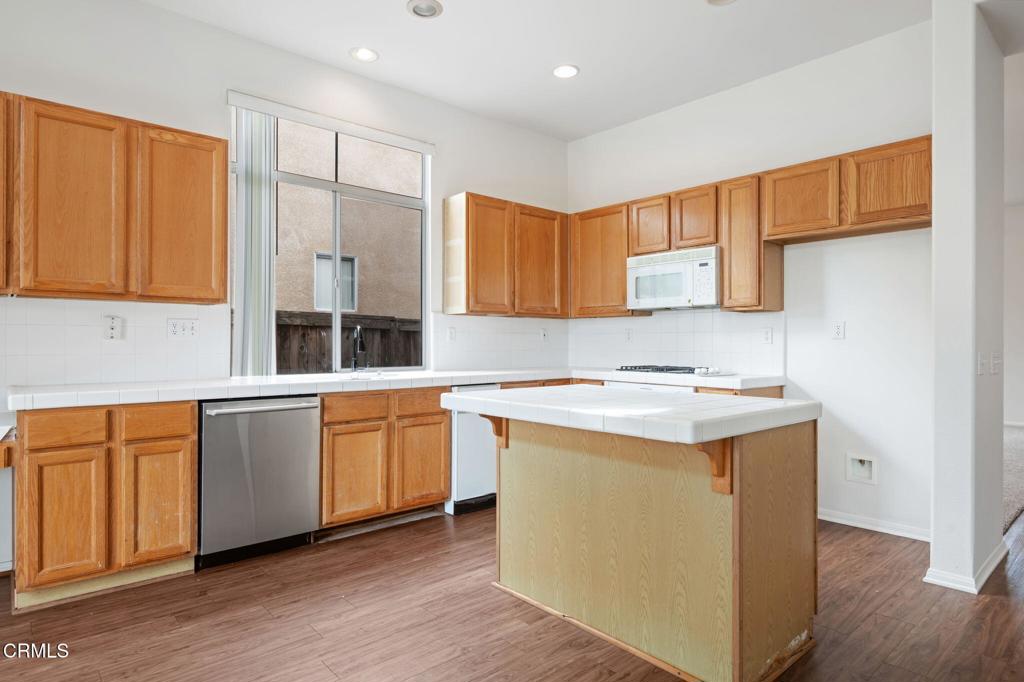 1930 Del Amo Way Oxnard, CA 93036 - Photo 15 of 31 a kitchen with a sink stove and cabinets