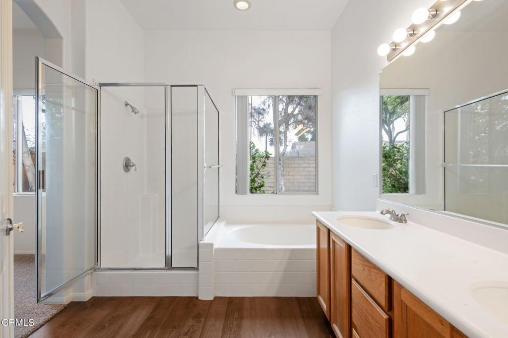 1930 Del Amo Way Oxnard, CA 93036 - Photo 21 of 31 a bathroom with a tub sink and mirror