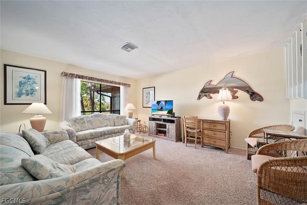 5117 Sea Bell Road, Unit F206 Sanibel, FL 33957 - Photo 16 of 47 a living room with furniture