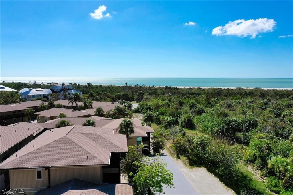 5117 Sea Bell Road, Unit F206 Sanibel, FL 33957 - Photo 2 of 47 an aerial view of a house with a swimming pool