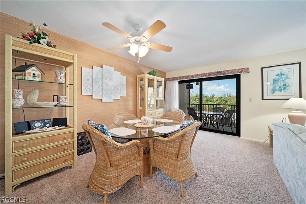 5117 Sea Bell Road, Unit F206 Sanibel, FL 33957 - Photo 23 of 47 a dining room with furniture and window