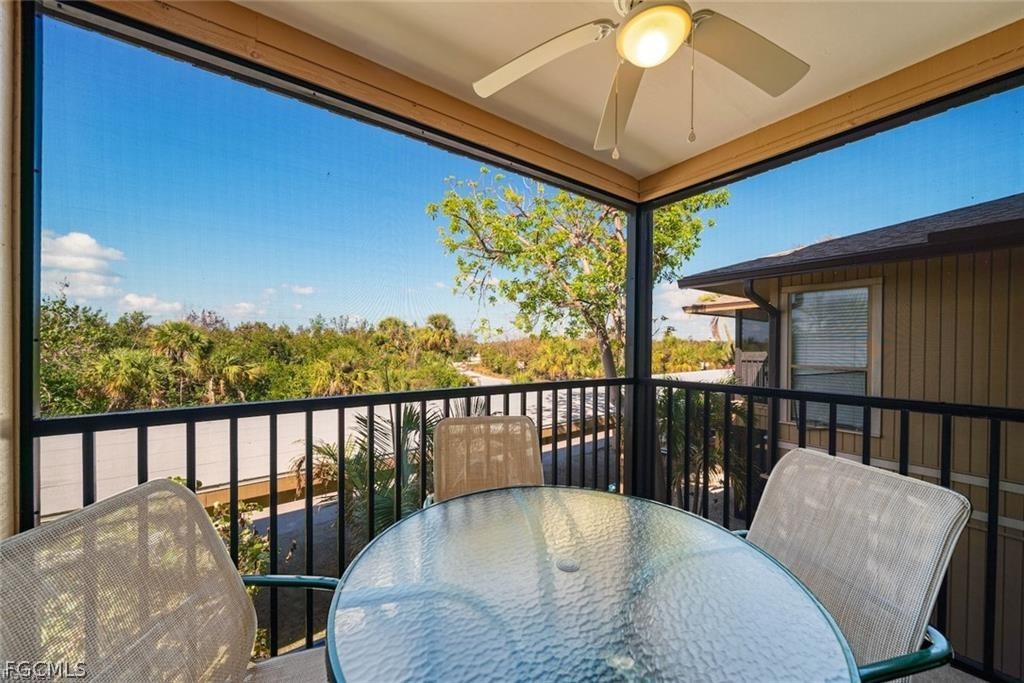 5117 Sea Bell Road, Unit F206 Sanibel, FL 33957 - Photo 26 of 47 a view of a balcony with furniture