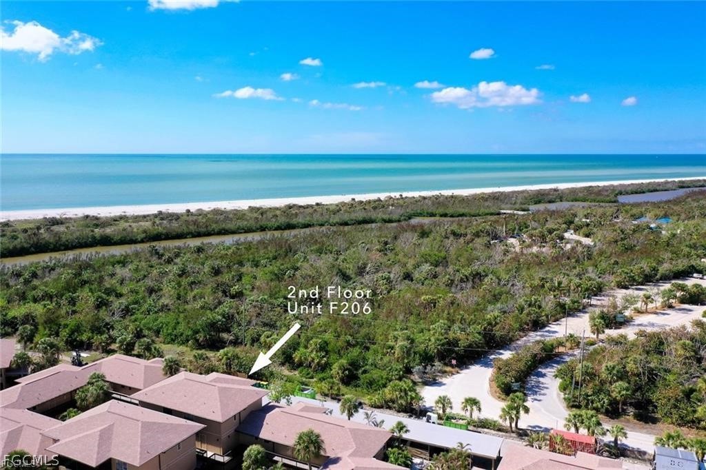 5117 Sea Bell Road, Unit F206 Sanibel, FL 33957 - Photo 4 of 47 a view of a city and ocean view