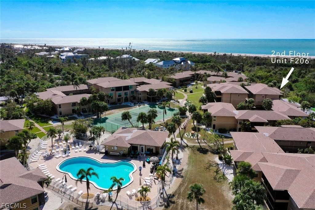 5117 Sea Bell Road, Unit F206 Sanibel, FL 33957 - Photo 8 of 47 an aerial view of a houses with a swimming pool