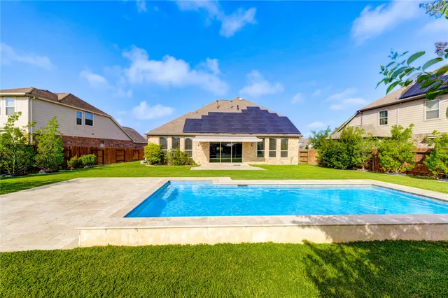 a view of an outdoor space with swimming pool