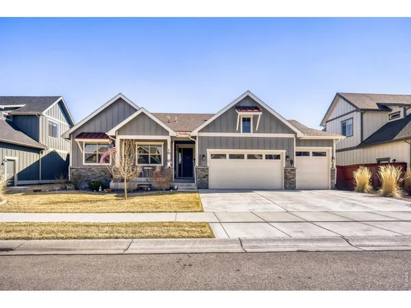a front view of a house with yard