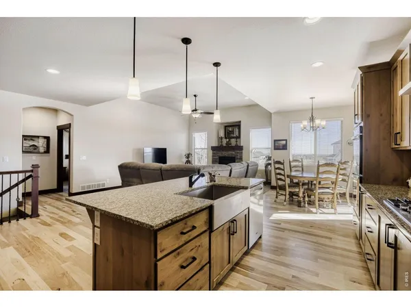 a view of a kitchen and kitchen island