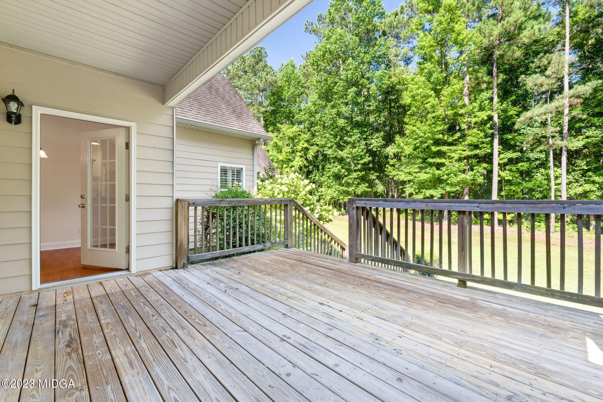 268 Godsey Road Jackson, GA 30233 - Photo 54 of 58 a view of backyard with a deck and wooden floor
