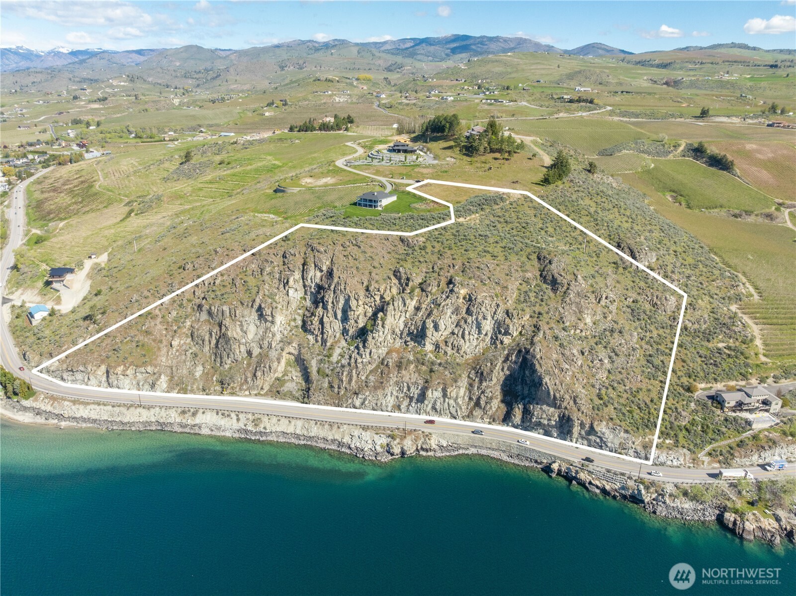 0 Rocky Point Lane Manson, WA 98831 - Photo 1 of 20 a view of an outdoor space and a lake view