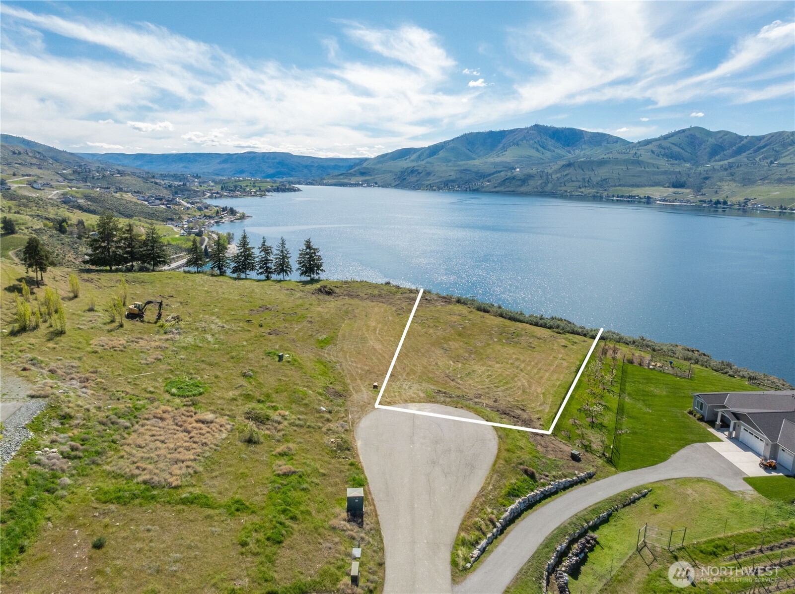 0 Rocky Point Lane Manson, WA 98831 - Photo 20 of 20 a view of a swimming pool with a lake view