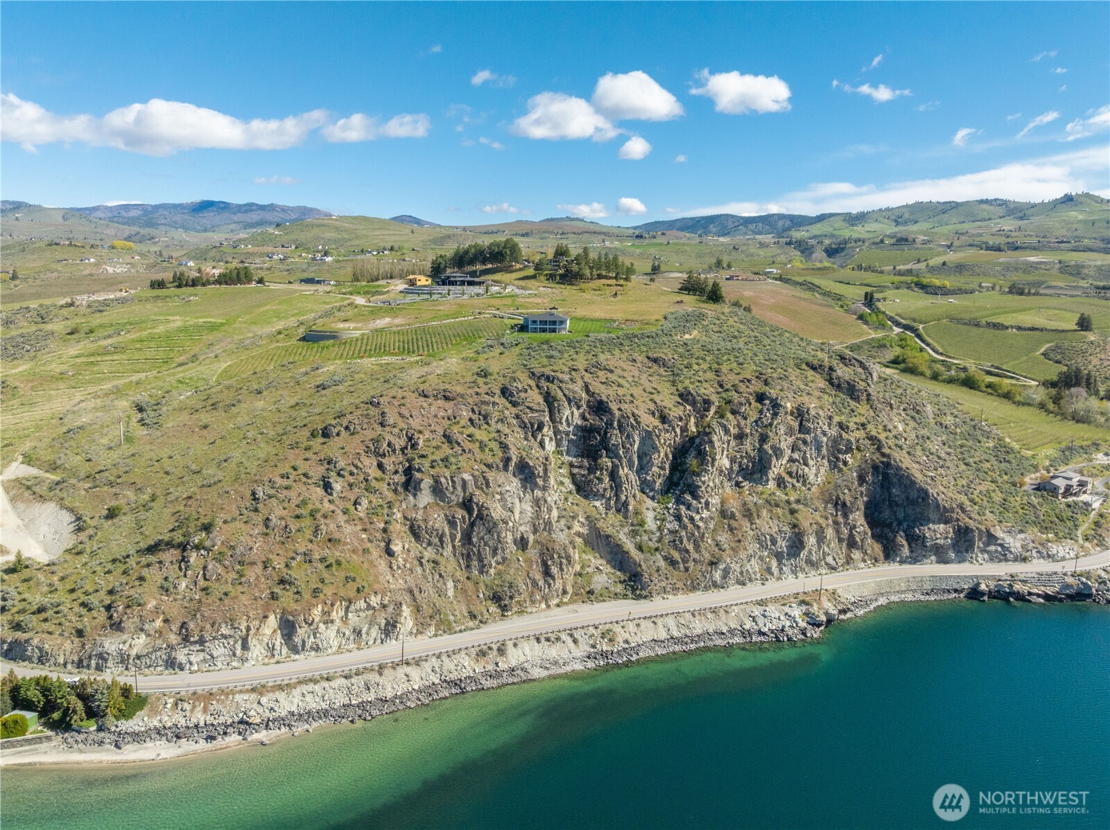 0 Rocky Point Lane Manson, WA 98831 - Photo 9 of 20 a view of an ocean and a mountain view