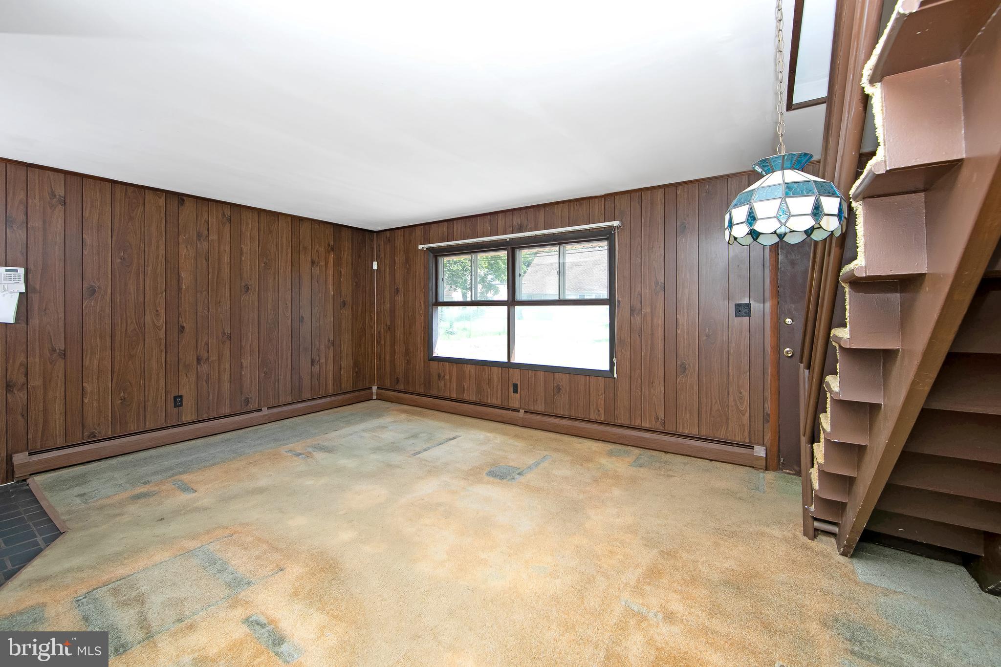 12 Geranium Road Levittown, PA 19057 - Photo 15 of 38 a view of an empty room with a window