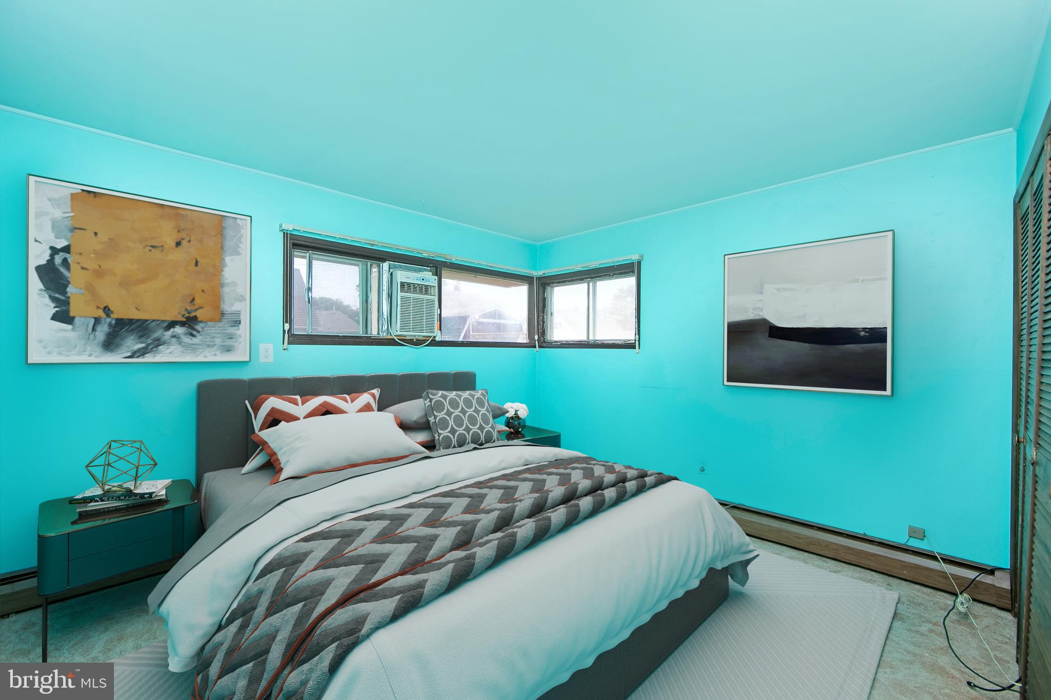 12 Geranium Road Levittown, PA 19057 - Photo 20 of 38 a bedroom with a bed and a window