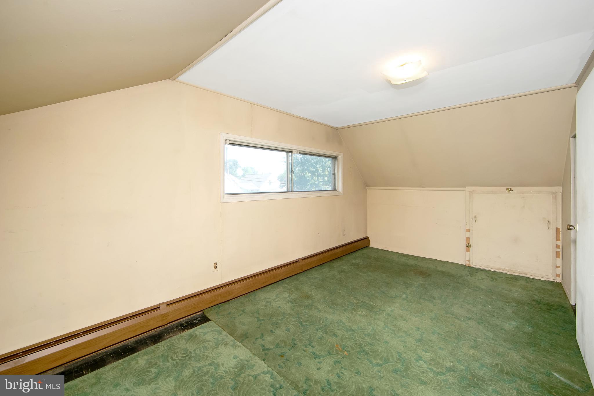 12 Geranium Road Levittown, PA 19057 - Photo 26 of 38 an empty room with a window