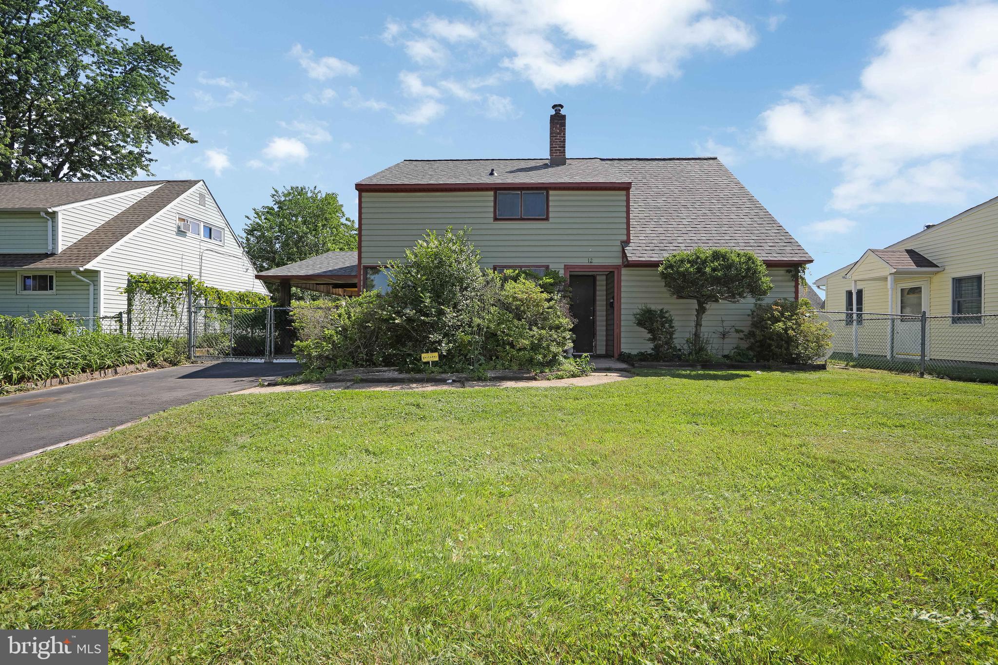 12 Geranium Road Levittown, PA 19057 - Photo 3 of 38 a front view of a house with a yard