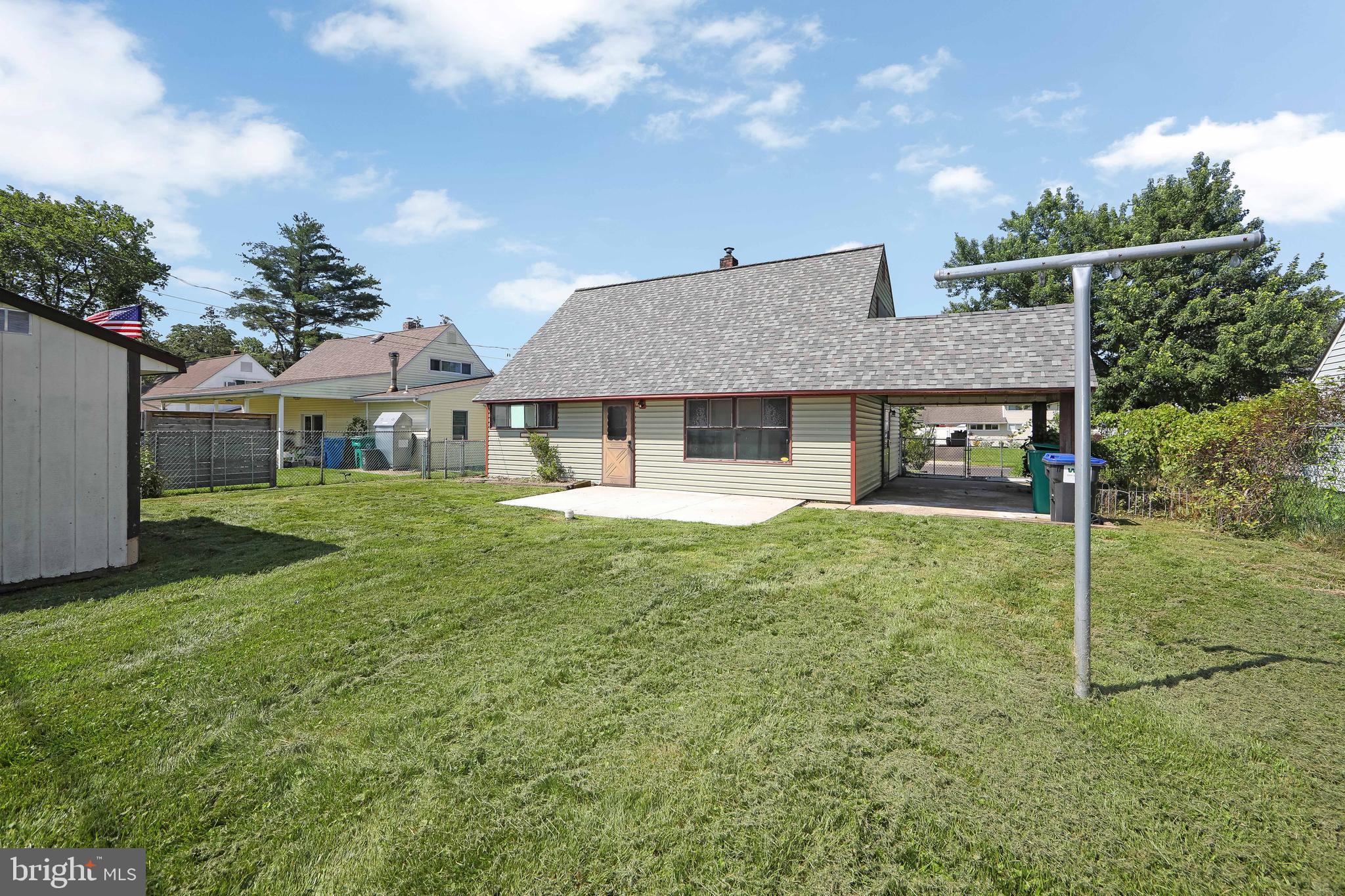 12 Geranium Road Levittown, PA 19057 - Photo 35 of 38 a front view of a house with garden