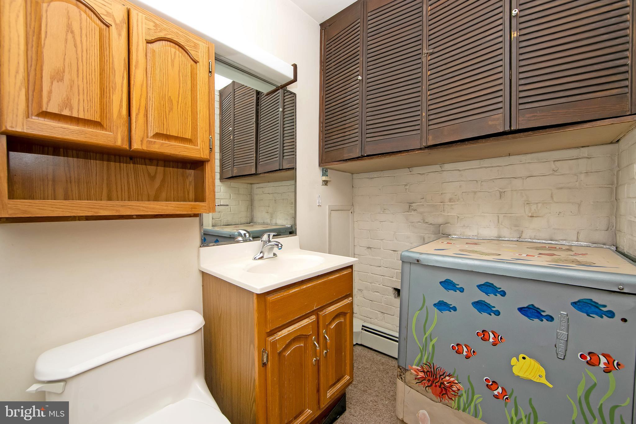 12 Geranium Road Levittown, PA 19057 - Photo 8 of 38 a utility room with dryer and washer