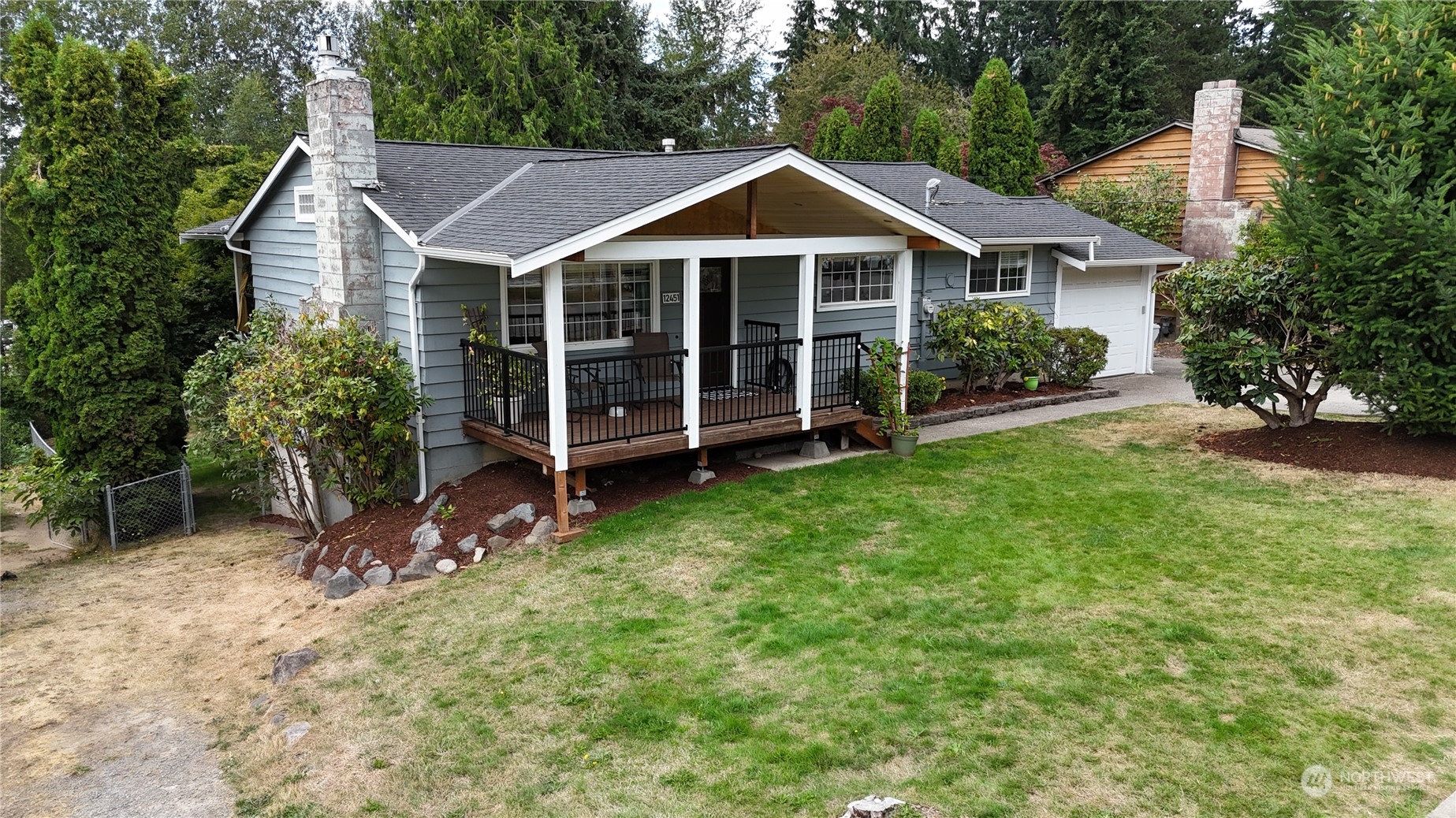12451 169th Avenue Southeast Renton, WA 98059 - Photo 2 of 40 a view of a house with a yard