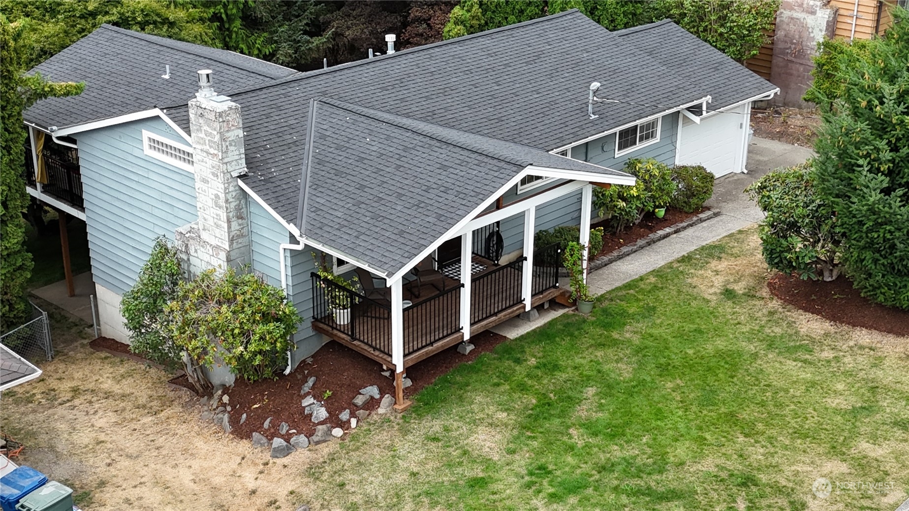 12451 169th Avenue Southeast Renton, WA 98059 - Photo 37 of 40 a aerial view of a house with a yard and plants