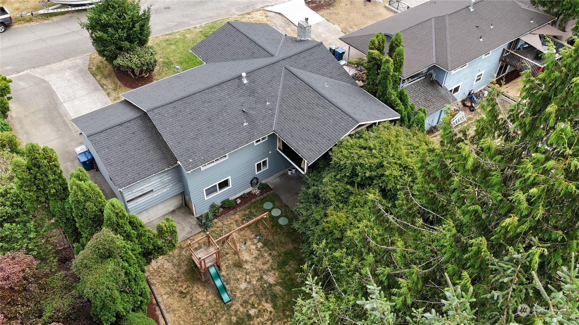 12451 169th Avenue Southeast Renton, WA 98059 - Photo 39 of 40 an aerial view of a house with a yard and garden