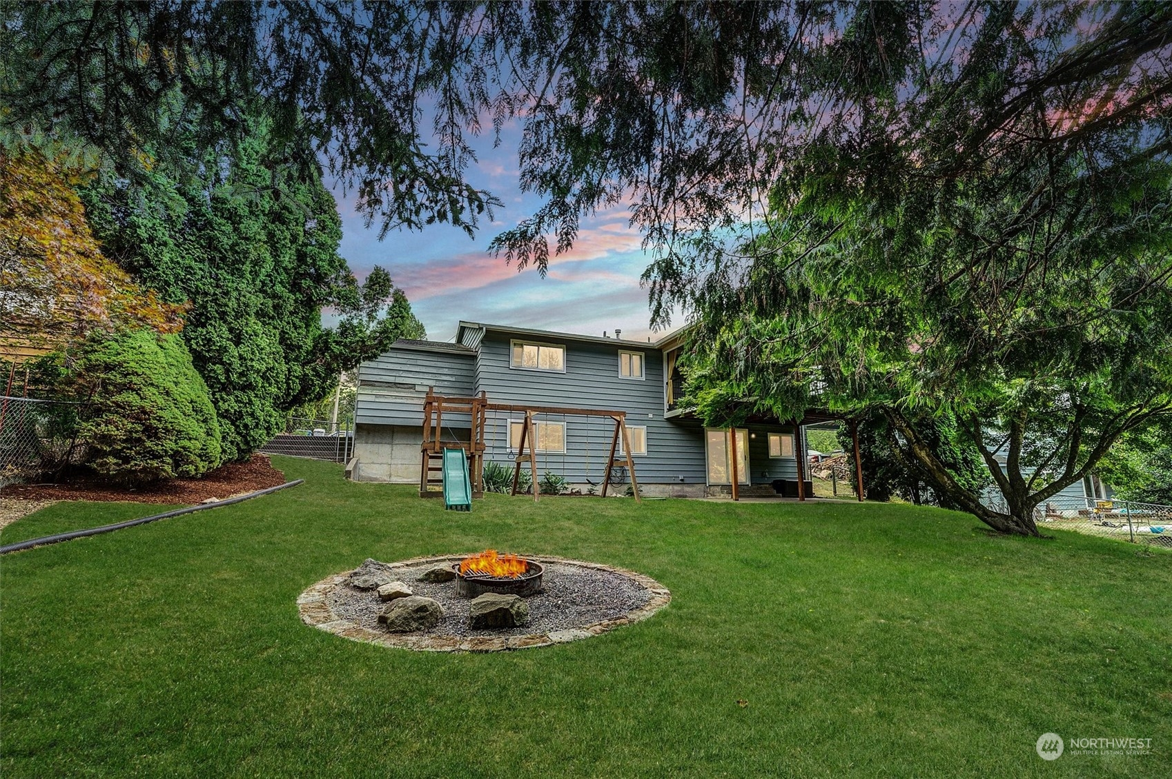 12451 169th Avenue Southeast Renton, WA 98059 - Photo 40 of 40 a front view of a house with a garden