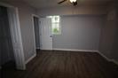 958 Church Street, Unit C Decatur, GA 30030 - Photo 10 of 11 a view of an empty room with wooden floor and windows