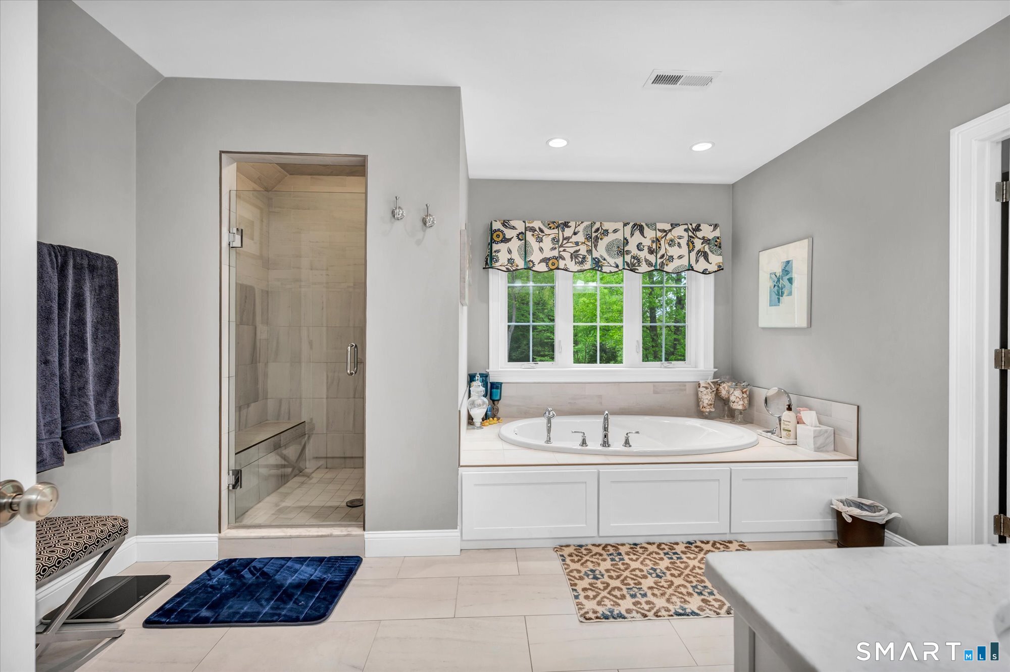 16 Sweetheart Mountain Road Canton, CT 06019 - Photo 32 of 40 a bathroom with a tub a sink and a window