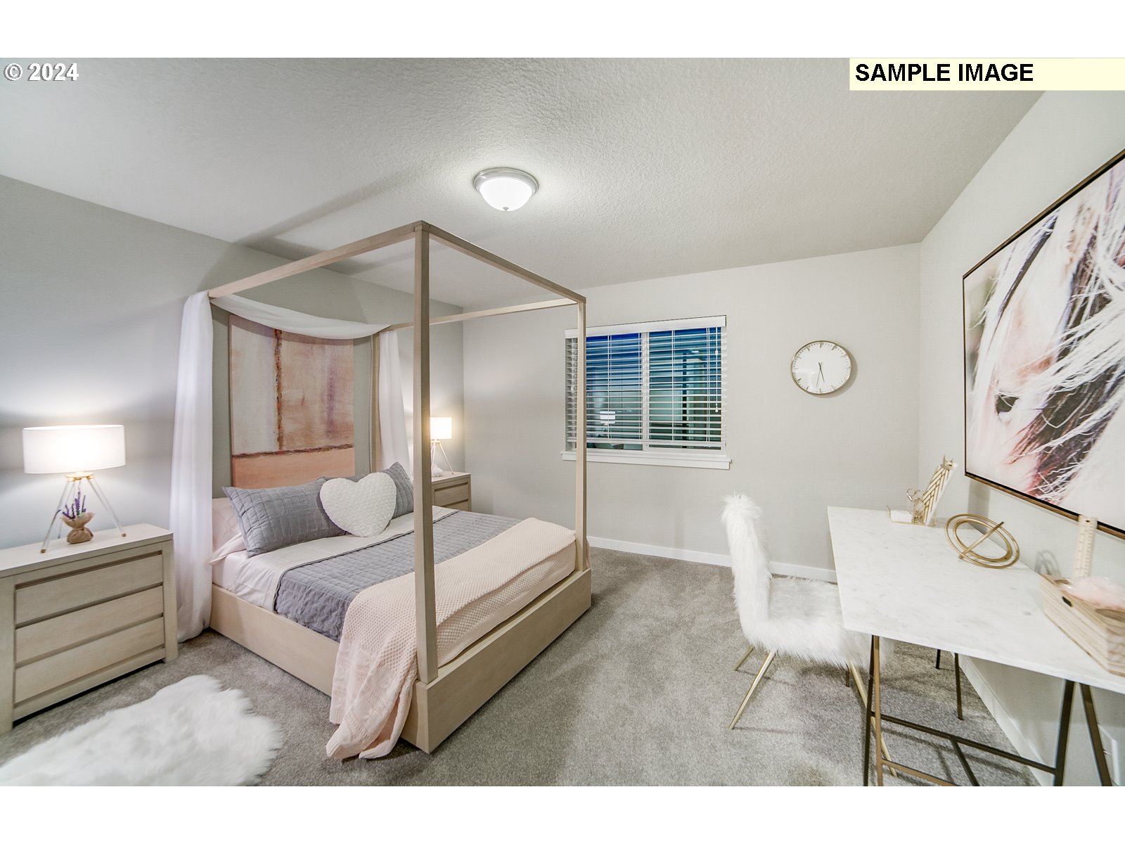 1344 North Kalani Loop, Unit LOT 65 Ridgefield, WA 98642 - Photo 14 of 24 a bedroom with a bed a table and chair