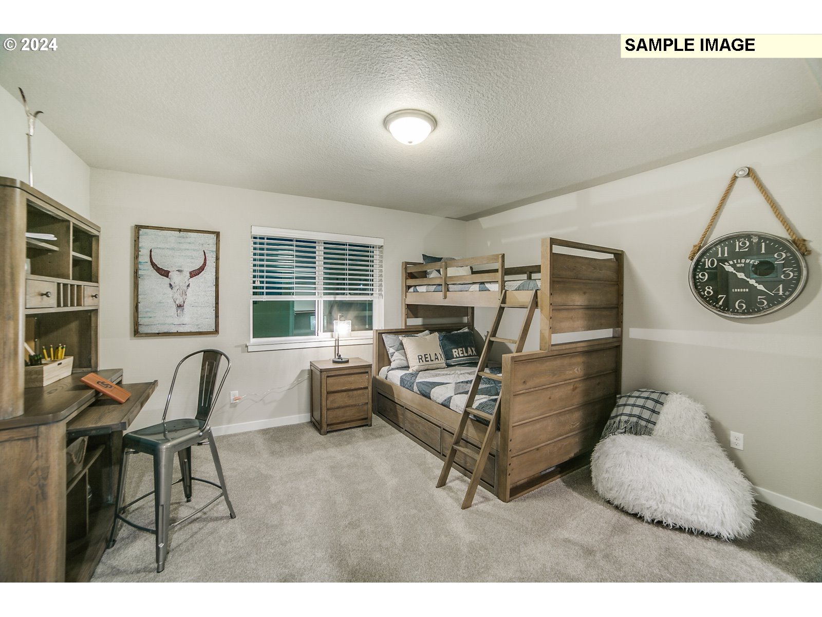 1344 North Kalani Loop, Unit LOT 65 Ridgefield, WA 98642 - Photo 16 of 24 a living room with furniture and a large window