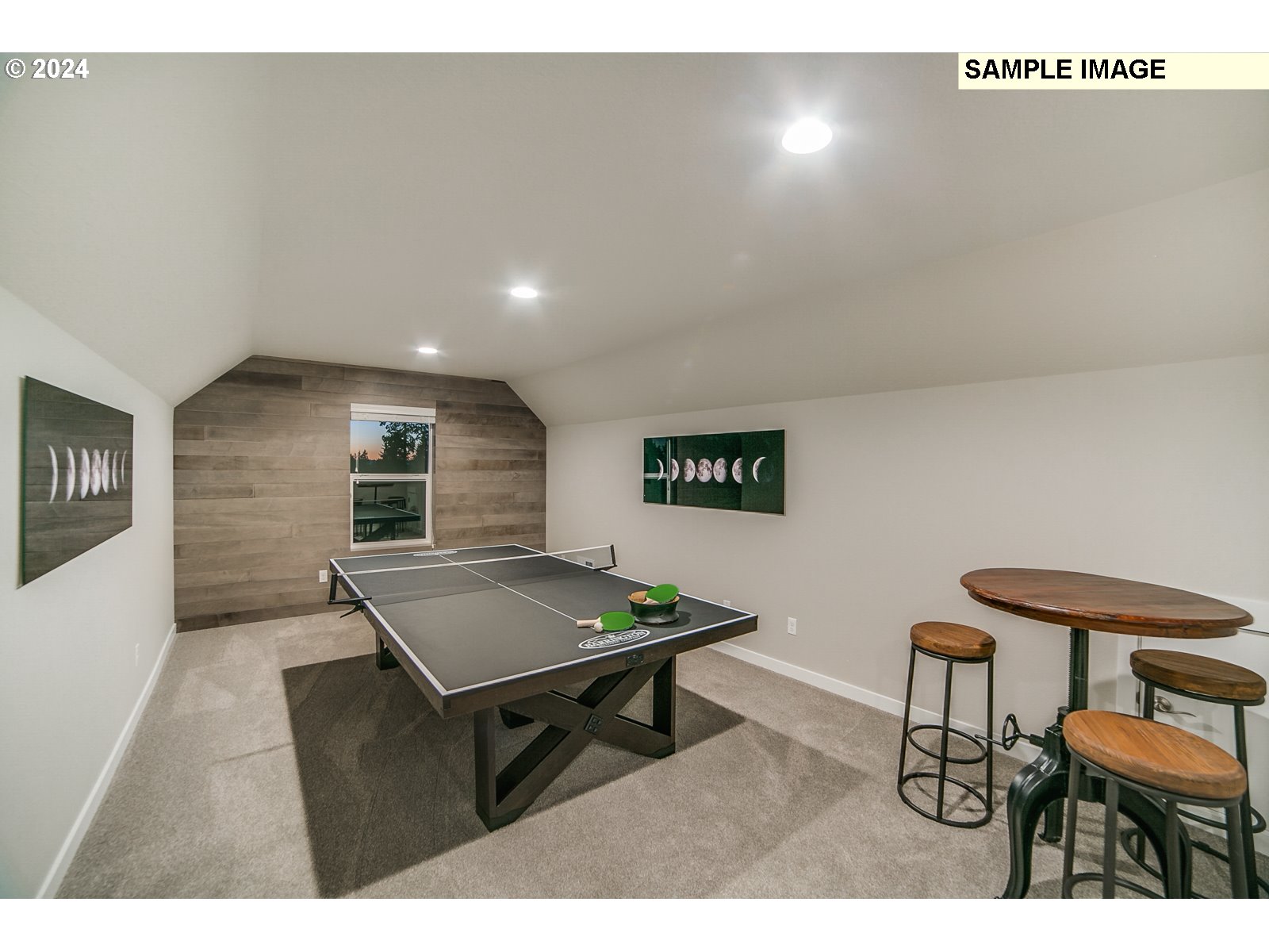 1344 North Kalani Loop, Unit LOT 65 Ridgefield, WA 98642 - Photo 18 of 24 a living room with furniture and a table