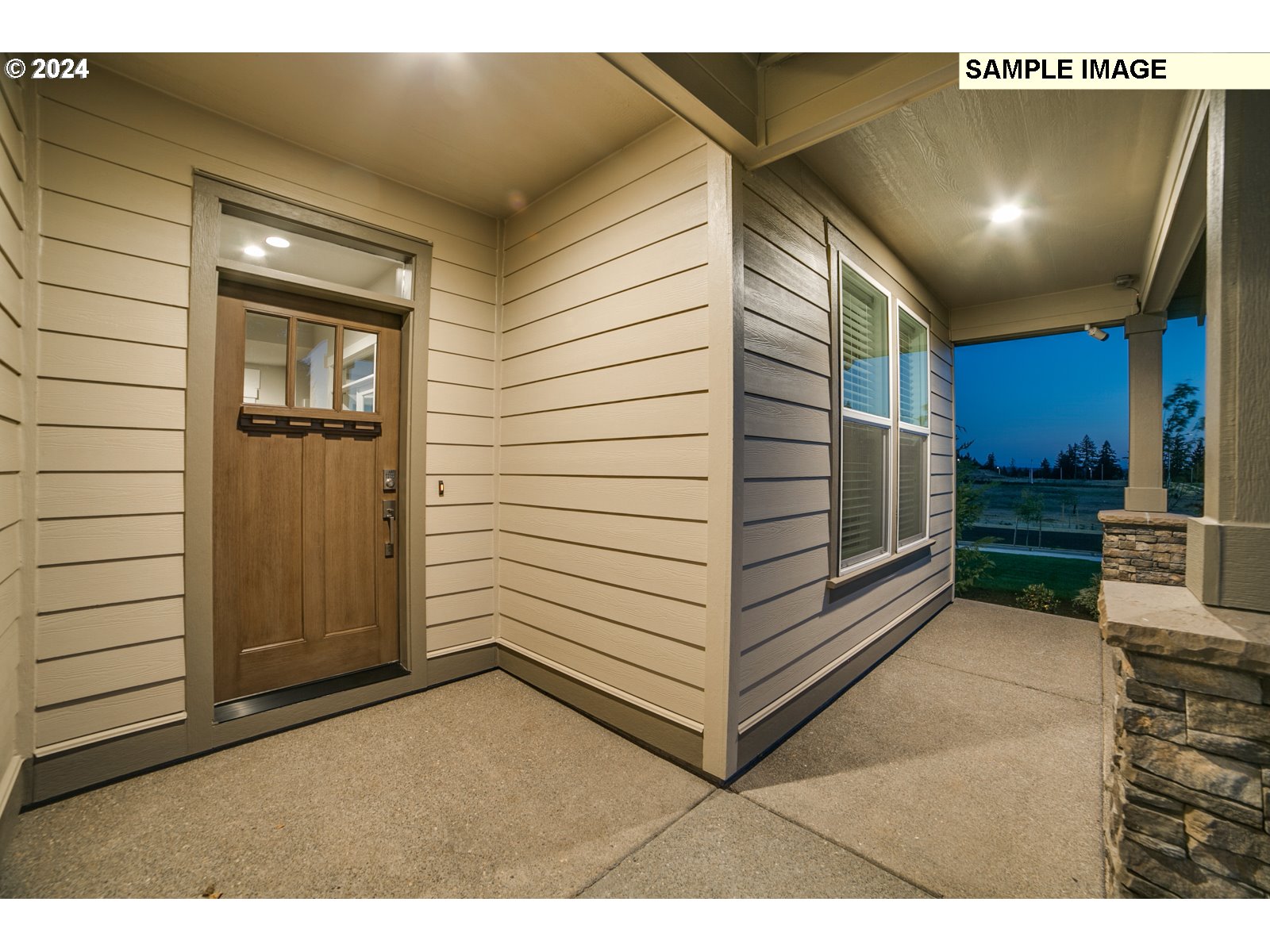 1344 North Kalani Loop, Unit LOT 65 Ridgefield, WA 98642 - Photo 20 of 24 a view of a entryway door of the house