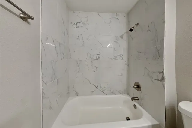 a bathroom with a bathtub