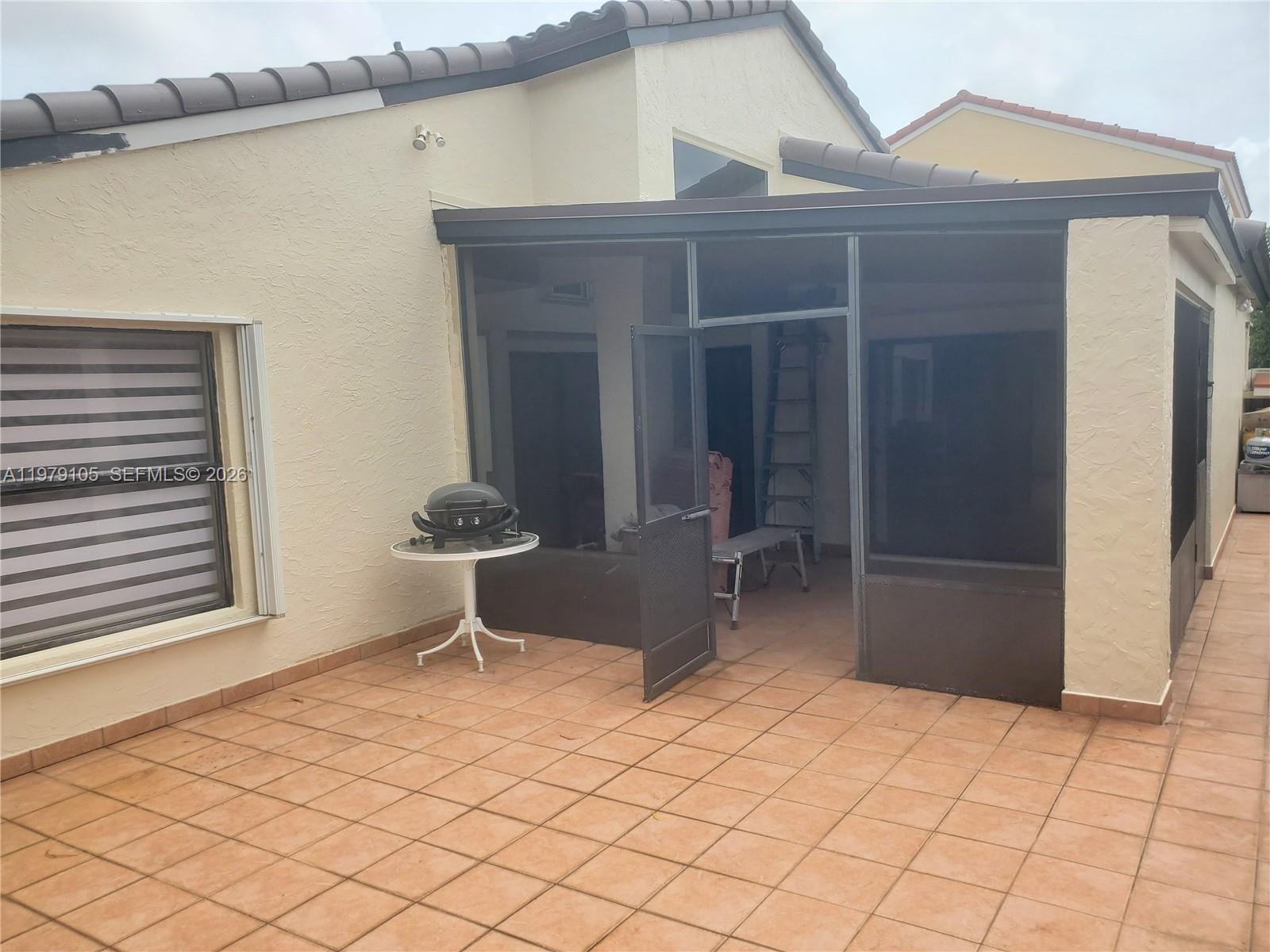 536 Southwest 88th Court Miami, FL 33174 - Photo 8 of 10 a house view with a outdoor space