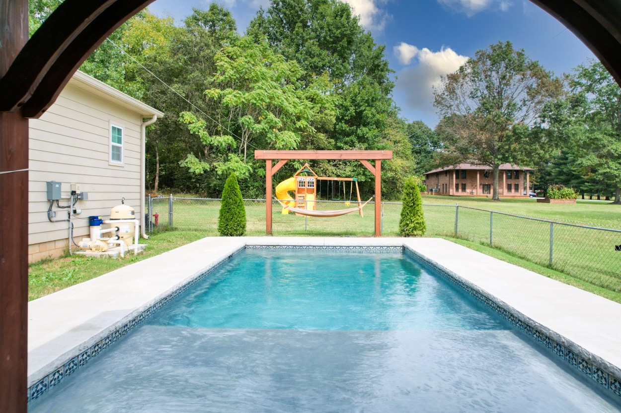 1775 Beckwith Road Mount Juliet, TN 37122 - Photo 14 of 64 a view of a backyard with a house and large trees