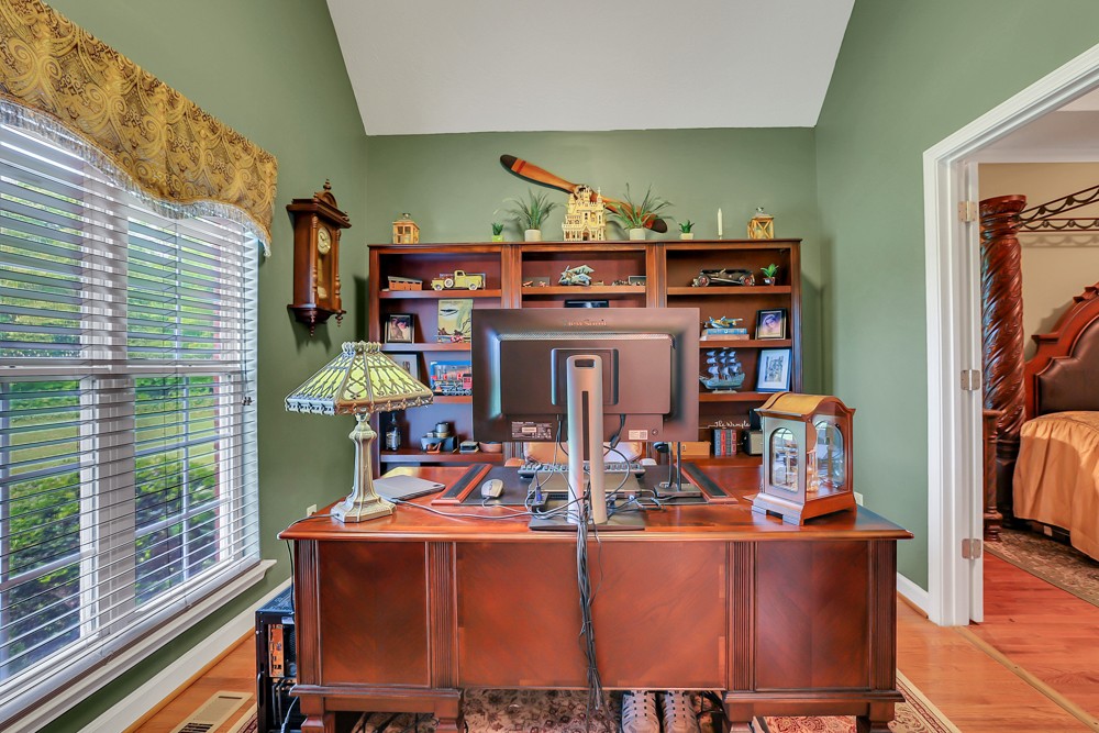 1775 Beckwith Road Mount Juliet, TN 37122 - Photo 28 of 64 a view of a dining room with furniture a rug and wooden floor