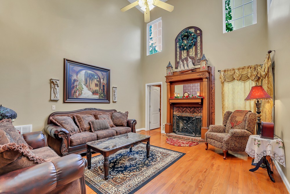 1775 Beckwith Road Mount Juliet, TN 37122 - Photo 43 of 64 a living room with furniture and a fireplace