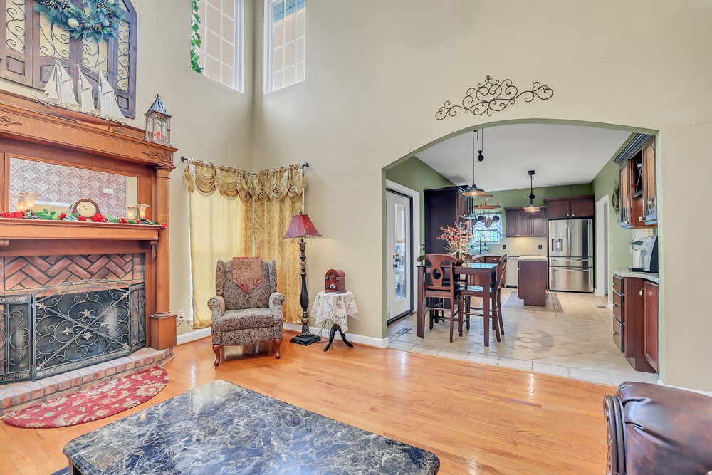 1775 Beckwith Road Mount Juliet, TN 37122 - Photo 45 of 64 a living room with furniture a window and a fireplace